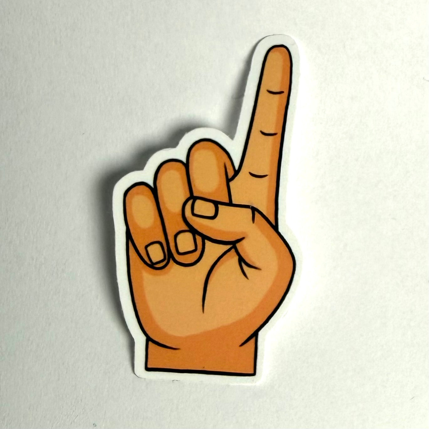 Osoittava etusormi tarra