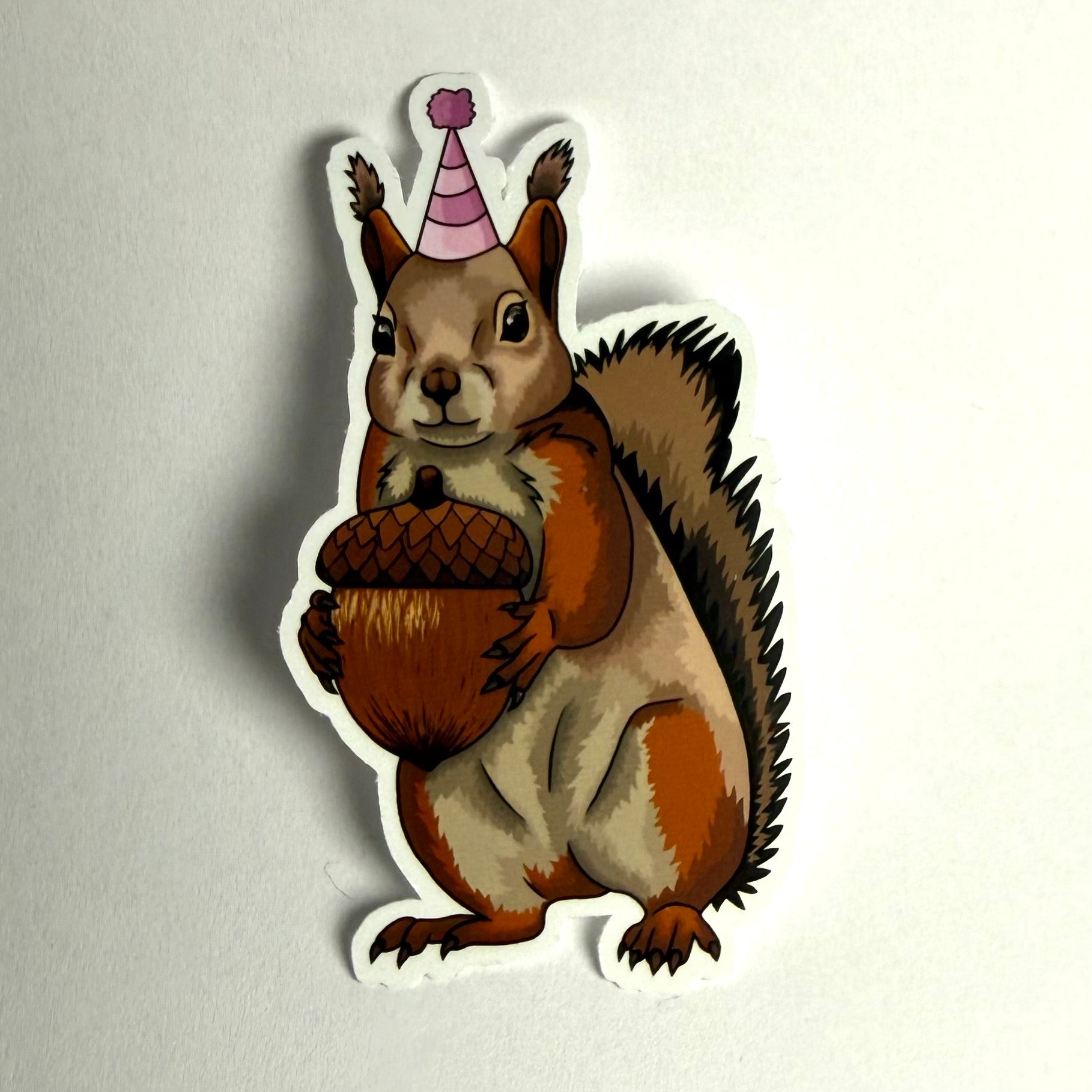 Juhlahattu orava tarra